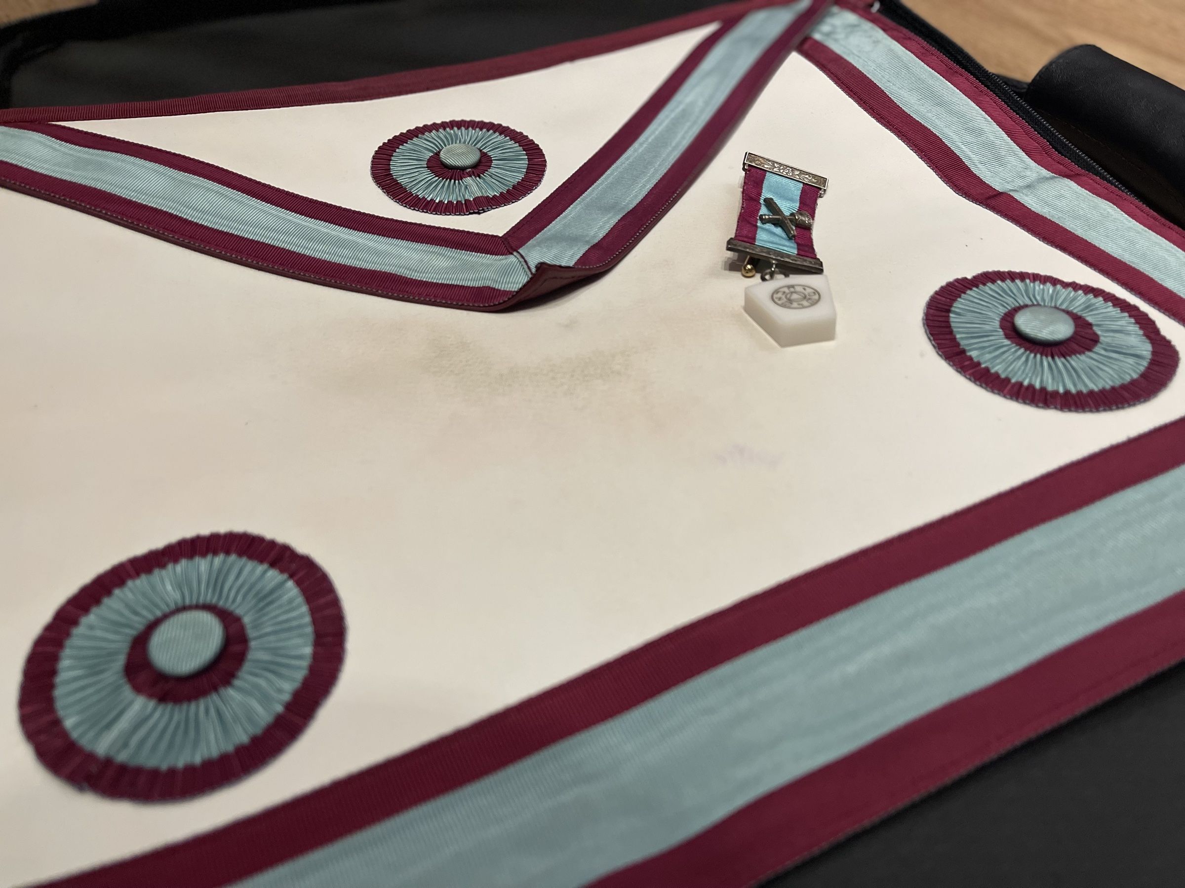 The Mark apron and breast jewel