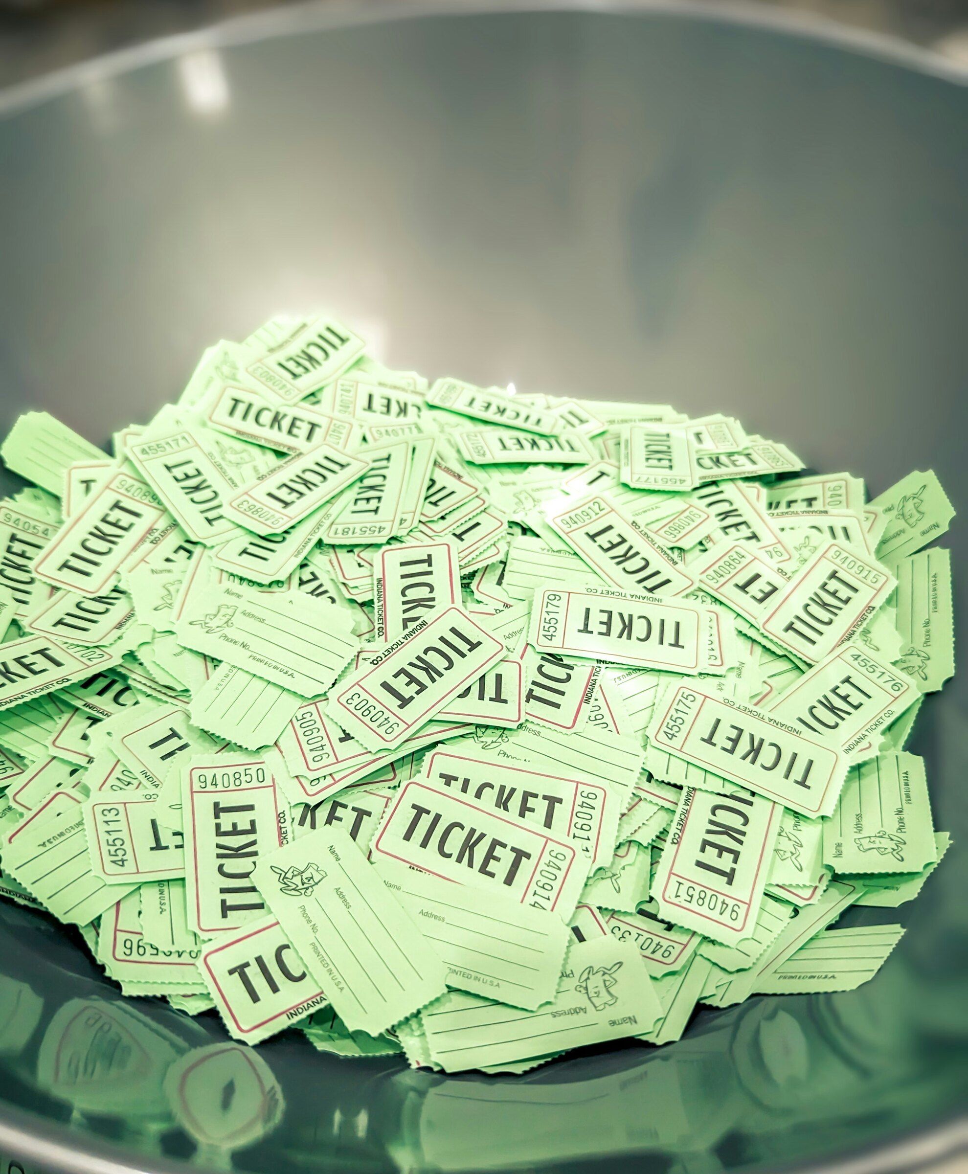 A bowl of raffle tickets