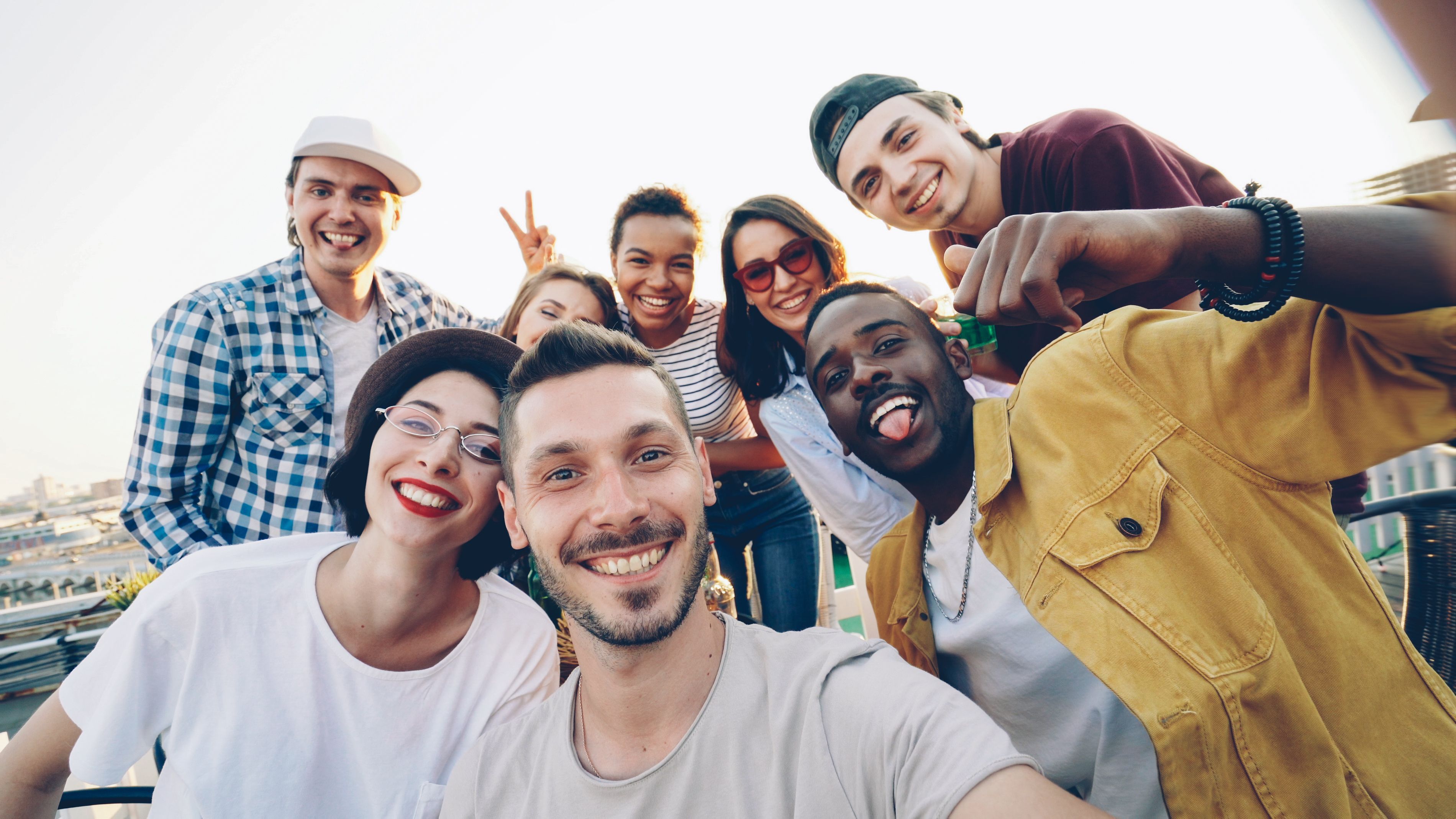 Friends together at a rooftop social